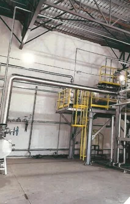 Industrial environmental treatment plant with pipework and access platforms