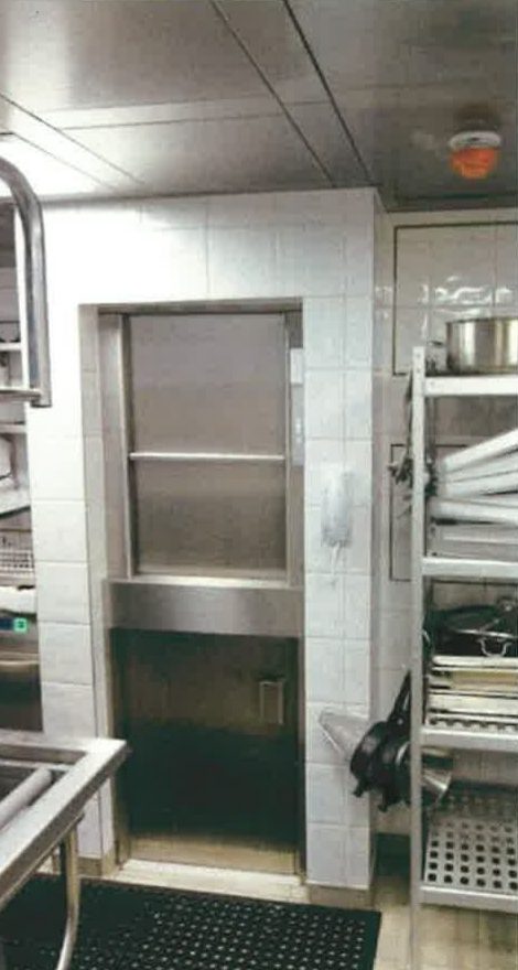 Commercial kitchen with stainless steel equipment